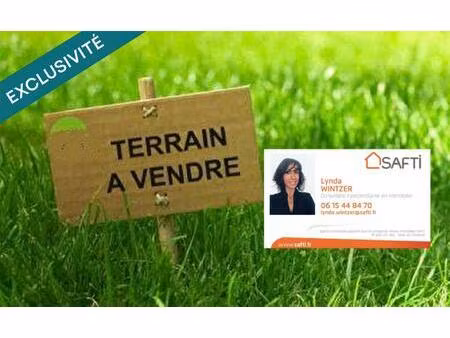 a ebersheim  proches commodités et axes routiers : beau terrain de construction 598m2