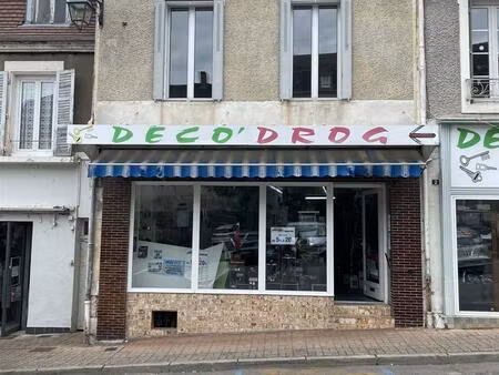 immeuble a usage mixte avec habitation et commerce