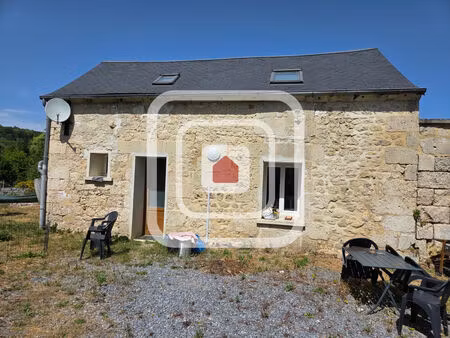 propriété comprenant 2 maisons