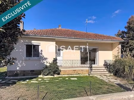 maison familiale de 98 m² avec jardin arboré.