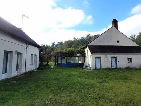 propriété de 337 m² (hab + gîte + dép) sur 10800m² de terrain.