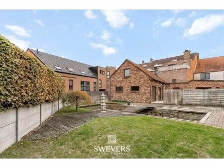 instapklaar handelspand met woonst en tuin in herk-de-stad