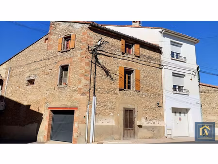 a vendre maison de village rénovée en deux faces avec garage