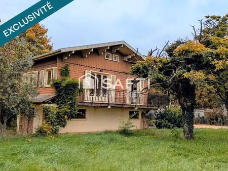 maison type chalet au bord de la rivière d'ain