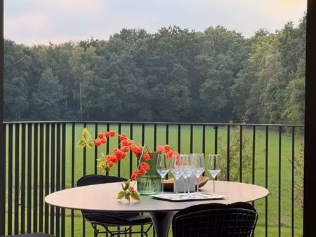 zonnig luxueus afgewerkt appartement met weids uitzicht!