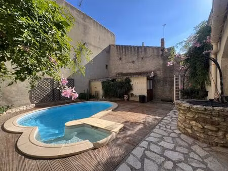 a vendre en exclusivite a cruzy maison t5 avec cour  piscine et local commercial