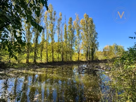 à vendre  belle propriété équestre avec maison en pierre  grange aménageable et lac privat