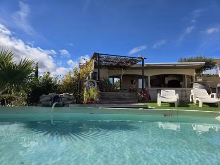 a vendre - cruzy - villa t4 de 137 m2 sur 1000 m2 de terrain et avec 220 m2 de garages