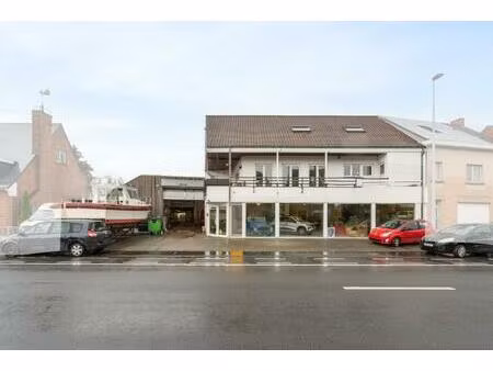 duplex appartement met handelszaak en werkplaats