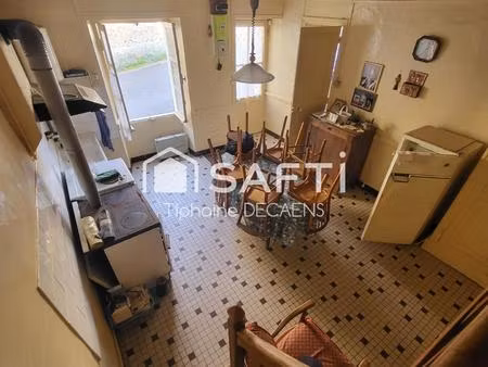 maison avec potentiel  village calme