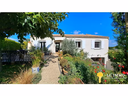 maison 157m2  belle véranda  jardin et grand garage