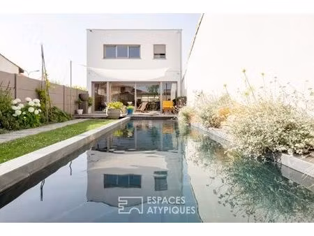 maison d'architecte bioclimatique avec jardin  piscine et stationnement au coeur du bousca