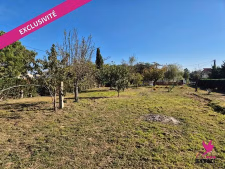 très joli terrain diffus de 1167 m² avec puits.