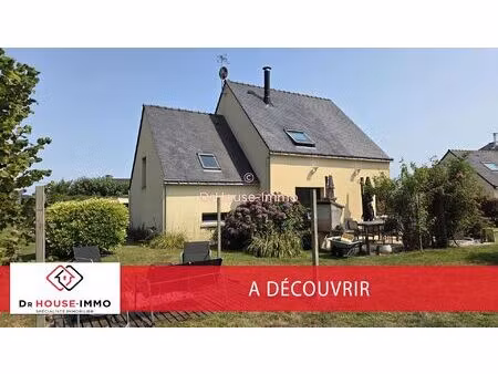 maison traditionnelle de 2006 d'environ 100 m² sur un terrain d’environ 2850 m².