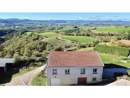 maison de 136m2 sur 909m2 de terrain avec grand garage à pla