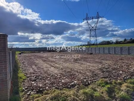 a vendre a cantin: magnifique terrain constructible de 1910 m2 clôturé avec 26 m de façade
