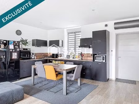 découvrez ce magnifique triplex de 125 m² de 2018 qui vous séduira par ses volumes généreu