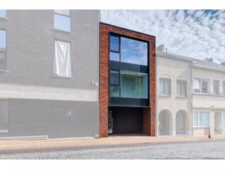 moderne woning met 2 slaapkamers  2 terrassen en garage in het centrum van hoeselt