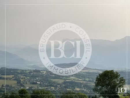 terrain arboré de 1176 m² à herbeys avec vue dégagée