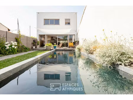 maison d'architecte bioclimatique avec jardin  piscine et stationnement au coeur du bousca