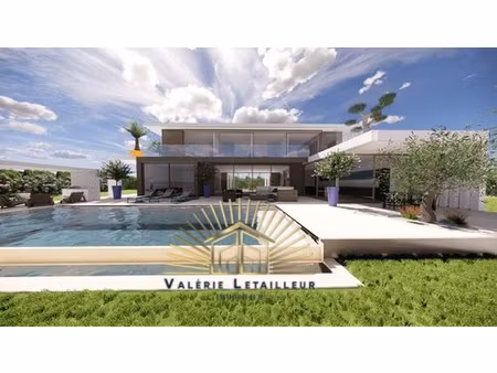 terrain 1643m2 avec permis de construire purgé prêt à constr