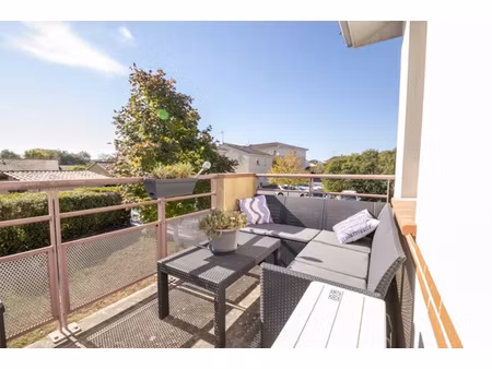 exclusivité  montbeton  bel appartement lumineux de type t3 avec terrasse et 2 places de p