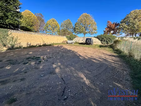 saint genis centre- prox commodites- terrain de 406m² au calme- permis de construire accor