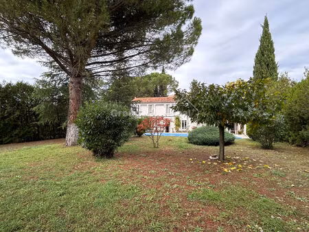 mas d'environ 214 m² sur parcelle constructible de 2080 m² avec piscine  garage et abri - 