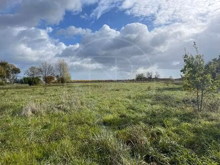 grand terrain à bâtir avec permis de construire pour deux maisons