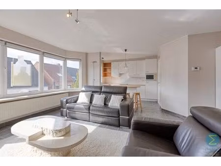 ruim 2-slaapkamerappartement met balkon  garage én kelder