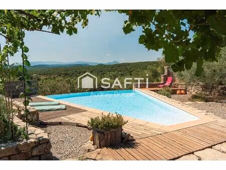 07460 st andre de cruzieres : maison en pierre avec piscine  vue et dependance
