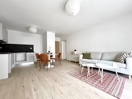 plantieres/queuleu : appartement 3 pièces 63m2 avec balcon et stationnement