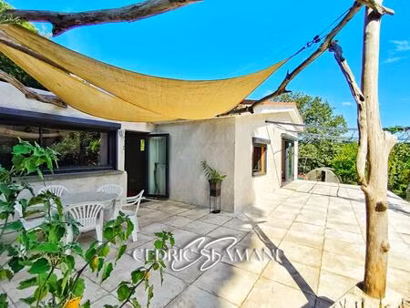 maison 65 m2  cuisine  1 chambre  1 mezzanine  salon  salle d eau  wc  terrasse  jardin