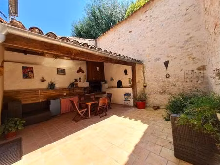 vente immeuble d'environ 127m2 comprenant 2 t3 + cour + garage