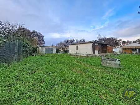 terrain 1268 m² avec maison et garage à izon