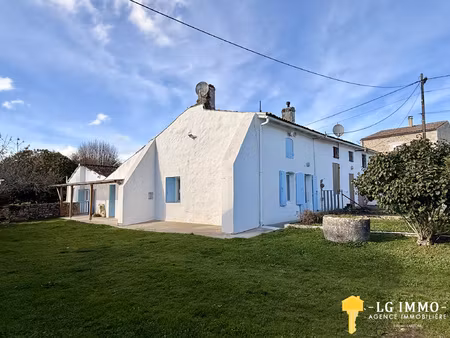 lot de deux maisons d'habitation  grange  atelier et terrain