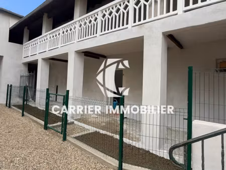 genay - rdc avec petit extérieur au sein d'une petite réside