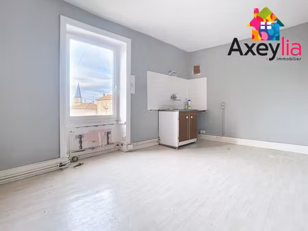 a vendre - cuinzier - appartement à rafraîchir et stationnements gratuits