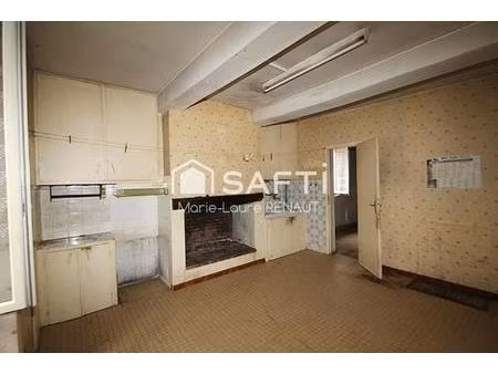 maison de ville à rénover - 2 chambres - petite terrasse et cave en sous-sol