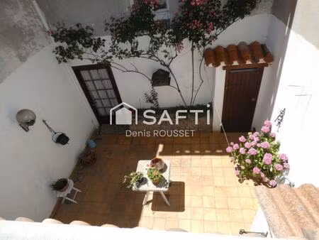 maison t5 d'environ 104m² avec jolie cour intérieure  2 terrasses et un garage - habitatio