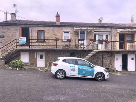 ensemble de 3 logements avec dépendances  garage et terrain dans centre ville de lapte