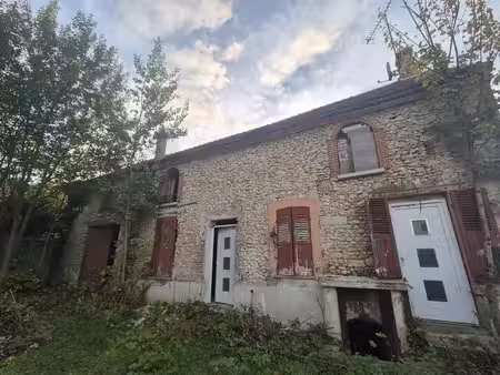 maison à rénover à sainte-colombe avec jardin et garage idéal pour investisseurs ou partic