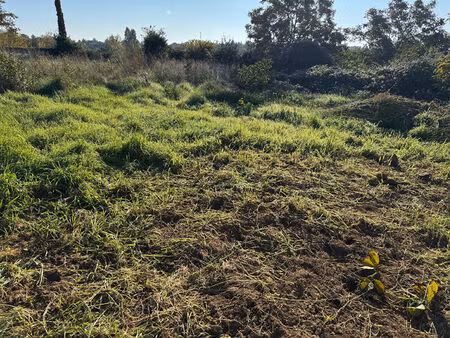 vente terrain  660.00m²  migné