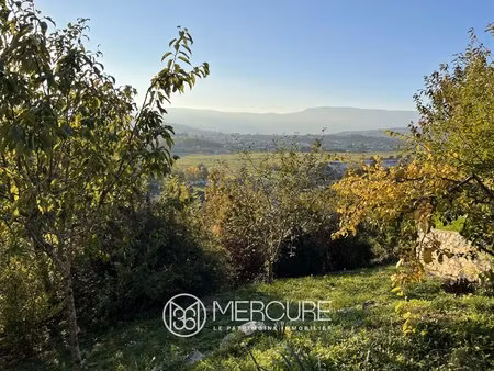 terrain constructible d’exception de 991 m2 avec vue panoramique à challes-les-eaux