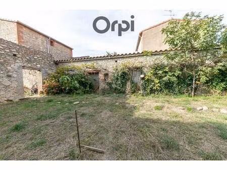 ensemble immobilier composé d'une grange et d'un terrain constructible