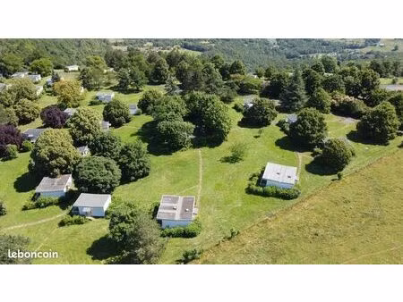 magnifique parcelle de 575 m² avec double chalets dans prl ayen (corrèze)