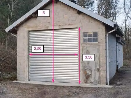 entrepôt 36 m2 - rideau de fer - caméra de surveillance