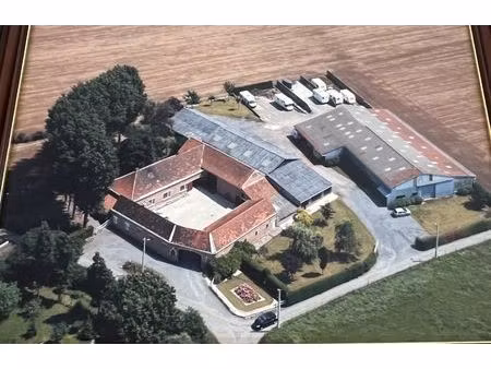 ferme sur 7000m² avec revenu locatif
