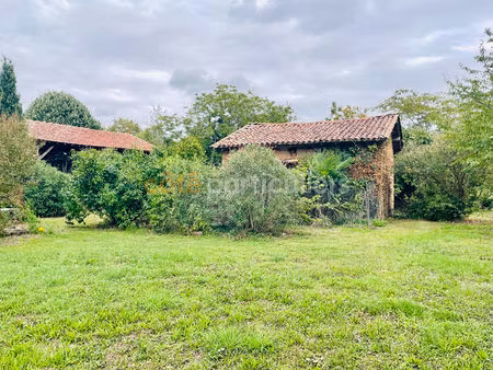 a vendre terrain 1000m² avec dépendances