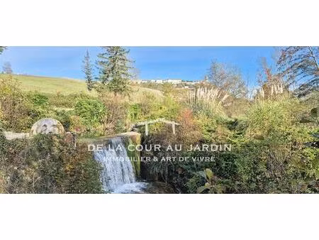 élégance et art de vivre : un moulin à eau seigneurial d'excepti